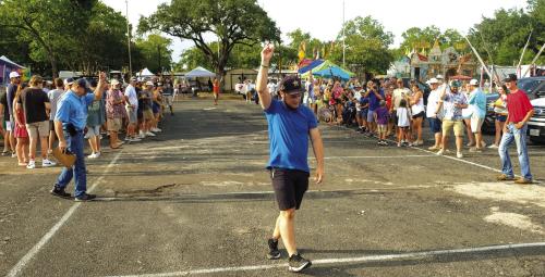 Photos by Andy Behlen Jay Heinrich holds up with winning catch in the Egg Toss Contest.