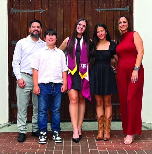 Fernando Gutierrez, left, Brandi Gutierrez, right, and in between their kids Drew, Jolie and Raylee.