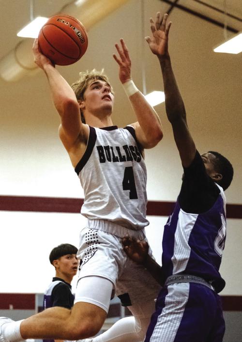 Flatonia’s Holden Kloesel goes up for a shot in Tuesday’s victory over Calvert. The Bulldogs have started the season 6-0. Photo by Stephanie Steinhauser