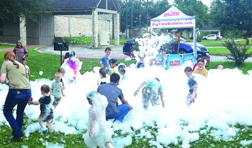 The Fayette Public Library concluded their 2024 summer reading program with a Party in the Park attended by hundreds of kids and their parents Thursday. Here’s a look at one of the party stations – a bubble machine. Photo by Jeff Wick