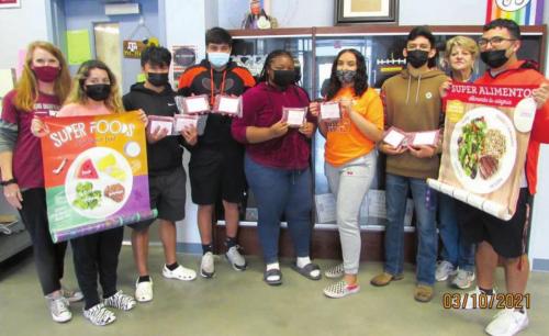 Schulenburg ISD receives beef. Pictured from left: Katy Henke, Lupita Toro, David Valazequez, Kevin Nieto, Nia Bacon, Dayasksi Tbarra, Alex Jiminez, Kathy Kutac/NVCW, and Ricky Toro.