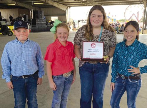 Abraham McBride, Kaisley Janecka, Rheagan Karisch, and Alexis Berckenhoff. Fayette County 4-H members competed at the Colorado County Fair in Columbus.