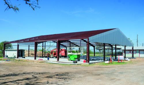 Supak’s Building and Roofing began framing the new German-Czech Mart at the Fayette County Fairgrounds this week. Workers had assembled most of the structural iron by Wednesday, March 19, with roofing work to follow. Staff photo by Andy Behlen