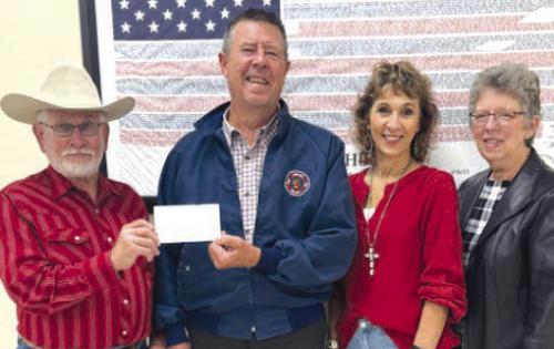 Pictured from left: KJT Vice-President Benedict Kallus, La Grange Fire Chief Frank Menefee, KJT Treasurer Brenda Fietsam and KJT Secretary Joyce Muras.