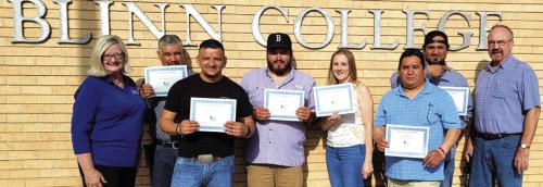 Six apprentice electricians have completed a Blinn College program preparing them for the journeyman electrician exam. Pictured are (from left) Dr. Becky Garlick, Executive Dean of the Schulenburg Campus; students Juan Toro, Daniel Uribe, Adam Guajardo, Deanna Langhamer, Luis Uribe-Flores, and Anthony Perez; and Douglas Behlen, electrical and HVAC instructor.