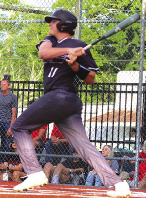 Fayetteville senior Parker Vitek smacks a homer in his final game at his home ballpark Monday. Photos by Lacey Vitek