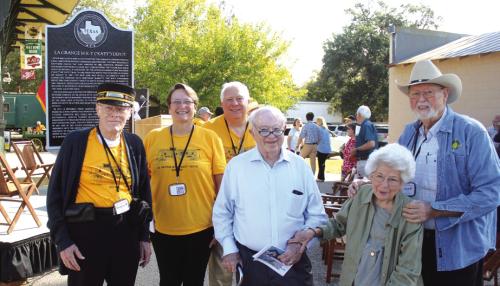 Members of the four families who got together to buy the La Grange railroad depot 25 years ago to save it, and keep it in its current location, unveiled the new historic marker there Tuesday at the conclusion of a ceremony (below). Left to right – Arnold Romberg, Gale and Gary Lincke, Drs. Royce and Elva Keilers and W.O. Wood. Photos by Jeff Wick