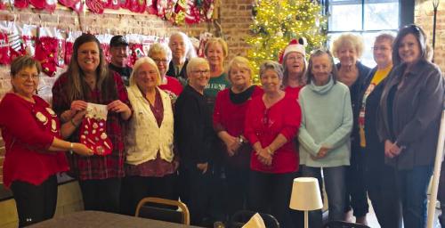 The Winchester Women’s Club, front from left: Joyce Herzog, Brittany Hendrix (CCA), Barb Schafer, Rhoda Gersch, Elizabeth Kipp, Bobbie Hajek, Liz Wallace, and Kelly Franke (CCA). Back row: Arla Hart, Dinah Breeden, Linda Hart, Michele Weth, Betty Richter, and LaVerne Schulze.
