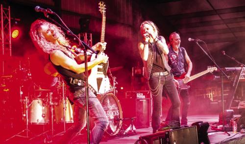 The 80s rock cover band LC Rocks got the party started Friday night at the Festival. Photo by Andy Behlen