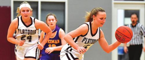 Katherine Bruns brings it down court in Tuesday’s win over Weimar. Photo by Stephanie Steinhauser