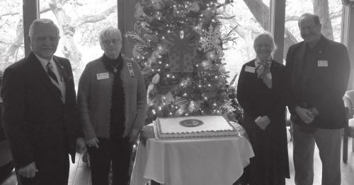 Pictured left to right: John D. Marburger, guest speaker Sue Lane McCulley, Regent Sally Reynolds, member and guest speaker Bruce Buckhorn. Both gentlemen accepted Service to America lapel pins