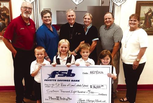 Pictured front row, from left: St. Rose students Waylon Neskora, Paisley Guentert, Henry Neskora, Drew Schneider; back row: Mike Olle and Cheryl Brossman, representing FSB and personal donors; Father Jasper Liggio, Taylor Jensen, St. Rose School Principal; Rodney Kalich and Darlene Brothers, representing FSB and personal donors.