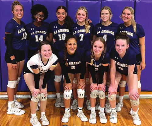 The La Grange girls pose after clinching a district-co-championship Tuesday in Austin.