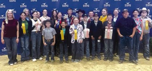 Front row: Joesph Carrales, Emma Zweschper, and Abigale McBride Middle Row: Coach Kaci Carrales, Adalyn Carrales, Addison Berckenhoff, Kaisley Janeka, Crockett Guenther, Tate Fritsch, Hudson Holub, and Hunter Gabler Back Row: Hailey Janish, Kinley Kutac, Tatum Fritsch, Alexi Berckenhoff, Holden Holub, Dylan Zweschper, Abraham McBride, Rheagan Karisch, Julia Melton, Laramie Laake, and Rilan Karisch.