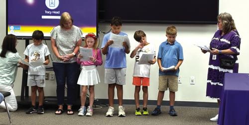 Some of the students who participated in Camp Summit this summer performed a readers’ theatre of the familiar story “The Three Little Pigs.” Shown here are staff members, Tracy Head-Director of Curriculum, Tammy Naumann-educational aide, and Sharon Novak-teacher, along with five of the students who participated in the camp.