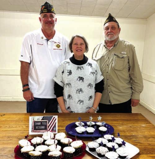 Veterans were especially remembered at the Nov. 15 joint social of the Fayette Memorial Post 5254 Veterans of Foreign Wars and Auxiliary of La Grange. The Veterans were thanked for their service and treated to cupcakes by the Auxiliary members. Pictured from left are Mitch Fuller, Senior Vice Commander of District 28; Marilyn Kothmann, President of VFW Auxiliary 5254; and Andy Kruppa, Commander of VFW Post 5254.