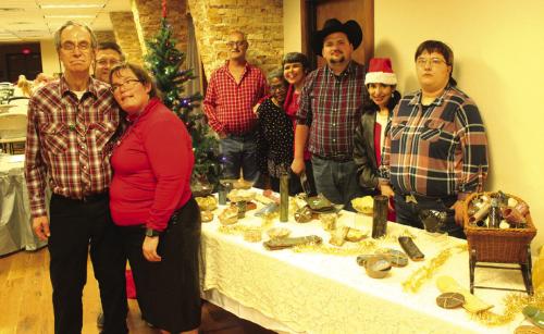 At the Gray Legacy Services Christmas Party earlier this month, the above residents had an entire table of the pottery they have made and are selling. Photo by Jeff Wick