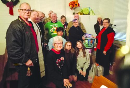 Members of the Winchester United Methodist Church collected 294 pounds of food to be delivered to the AMEN Food Bank of La Grange. The food was blessed at the Christmas Eve service by Pastor Patricia Zaiontz-Newcomer. A cash donation was also collected during the service.