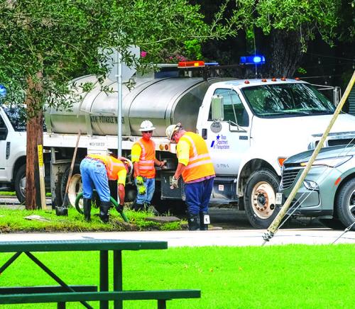 A crew from the Texas Department of Transportation cleaned out the stormwater drain under US 77 near the Faison Home and Fayette Public Library in La Grange. That area has been prone to flooding during heavy rains. La Grange City Manager Jack Thompson said the work will hopefully improve drainage in that area. Staff photo by Andy Behlen