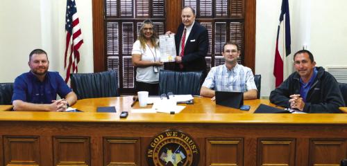Fayette County Commissioners Court signed a proclamation last Thursday designating April as Child Abuse Prevention Month in Fayette County. On hand for the signing was Cindy Chester of Youth and Family Services. Pictured are (from left) Pct. 4 Commissioner Drew Brossmann, Cindy Chester, County Judge Dan Mueller, Pct. 2 Commissioner Clint Sternadel and Pct. 1 Commissioner Jason McBroom. Photo by Andy Behlen
