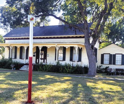 Endowment “thermometer” in the yard of the N.W. Faison House at 822 S. Jefferson in La Grange marks the progress of the endowment fund needed to keep the house operational.
