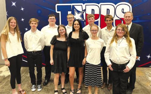 Members of the group are Jay Woelfel, Donovan Phillips, Elijah Kueck, Kaylee Wolff, Hudson Stueber, Elena Matus, Miriam Meyer, Layna Woelfel, Robert Wolff, Elizabeth Richardson and Director Dan Schaefer.