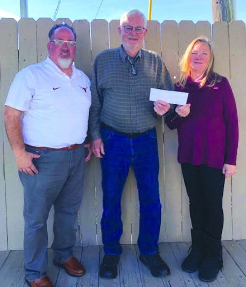 The Holy Smokers of St. James Episcopal Church made a $1,000 special year end donation to Tejas Healthcare. Pictured from left are Gene Carson, Tejas CFO, Holy Smoker Joe Bailey, and Tejas Healthcare CEO Sheri Kehler.