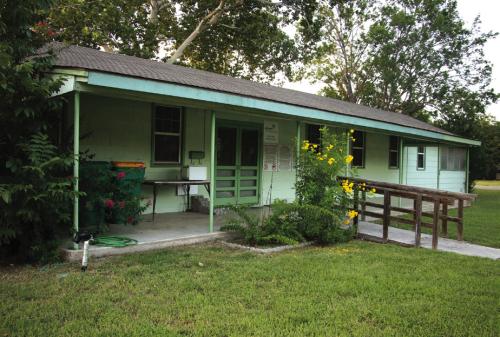 The local Girl Scout Troop has been informed by the Girl Scouts of Central Texas organization that they have 30 days to gather their things and vacate the Girl Scout Hut at the corner of Milam and Vail, so it can be sold. Photo by Meadow Taylor-Marklin