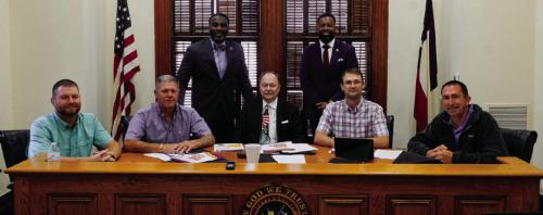Prairie View A&amp;M Extension Agent Ronnie McDonald (back, left) and Natriez Peterson (back, right), assistant program leader at Prairie View A&amp;M Extension, introduced themselves to the Fayette County Commissioners Court last Thursday. They are pictured with (seated, from left) Pct. 4 Commissioner Drew Brossmann, Pct. 3 Commissioner Harvey Berckenhoff, County Judge Dan Mueller, Pct. 2 Commissioner Clint Sternadel and Pct. 1 Commissioner Jason McBroom. Photo by Andy Behlen