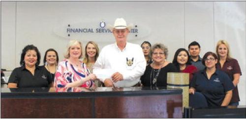 Prosperity Bank of La Grange presented a $500 donation to the La Grange Police Department on Friday, June 9. Brenda Seberger, Banking Center Manager, is shown presenting the check to Police Chief David Gilbreath. Pictured from left are Suzette Zarr, Kelsey Gerik, Brenda Seberger, Ashley Kubala, Chief Gilbreath, Carolina Fuentes-Aktas, Barbara Janacek, Chelsie Garcia, Juan Perales, Celia Arrighi and Marsha Hutton.