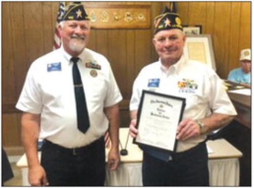 Pictured from left is Commander Richard Gray and James Bramblett.