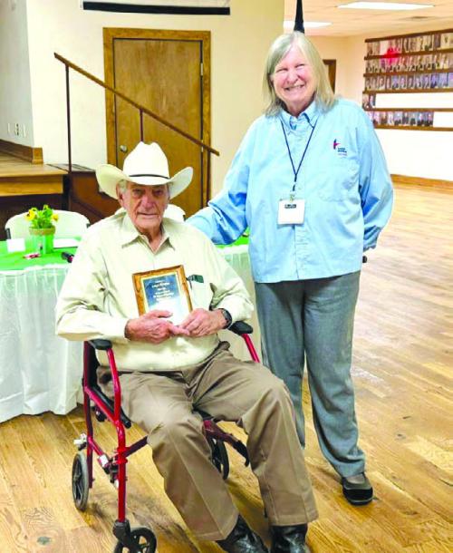 Lloyd Brunner with Fayette County Farm Bureau’s Vice President Lemae Higgs.