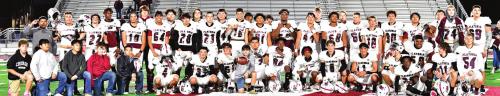 The Flatonia Bulldogs pose on the field after Friday’s victory over Johnson City in San Antonio. Photo by Stephanie Steinhauser