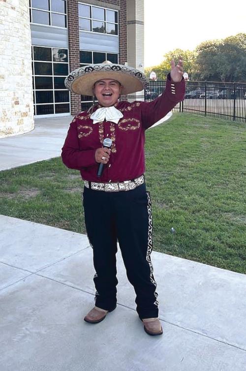 In celebration of Hispanic Heritage Month, La Grange Elementary School had Hispanic community members open doors for students Friday morning. Juan Carlos el Charro, pictured, a former La Grange student, also peformed music.