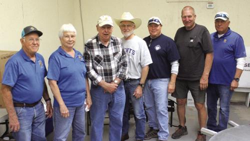 Just a few of the army of Knights of Columbus volunteers who helped feed thousands of the cyclists over the weekend at the MS 150 in La Grange. Left to right: Clarence Faldyn, Mary Baca, J.R. Baca, Jim Kothmann, Chris Proske, Doug Mueller, and Randy Proske. Photos by Jeff Wick