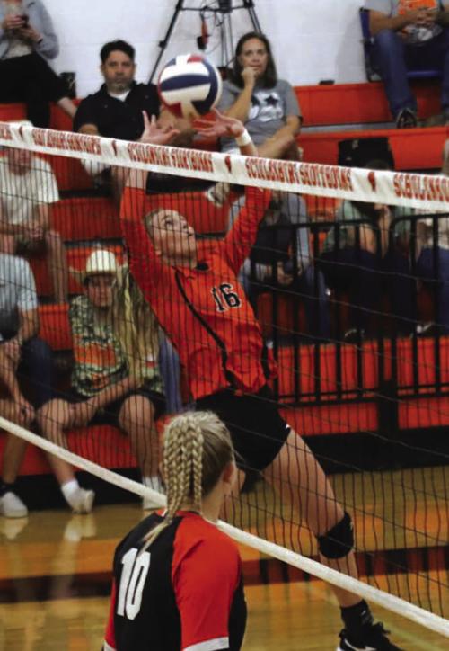 Schulenburg’s Jenna Guentert sets a ball in Tuesday’s victory over Smithville. Photo by Audrey Kristynik