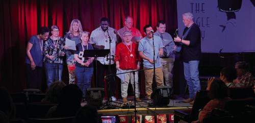 Above, Grammy winners Terri Hendrix and Lloyd Maines perform with the Gray Legacy Bluebird Choir during the finale of the SongBuddies concert last Wednesday.