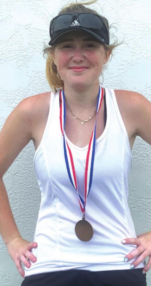 Kambri Mihatsch with her bronze medal from regionals.