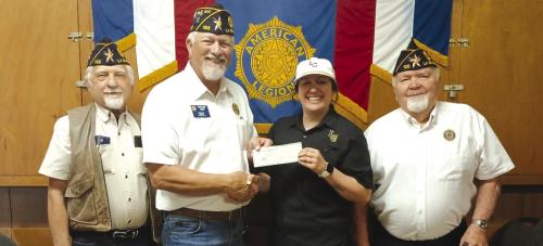 The American Legion, H J Ehlers Post 102 of La Grange voted to assist area Little League teams with Sponsorship of 4 teams in the playoffs. Pictured (left to right) are John Marburger (Judge Advocate), Richard Gray (Commander), Samantha Zoch (La Grange Little League Board Member), and Ray Thurman (Hubmaster and Surgeon General).