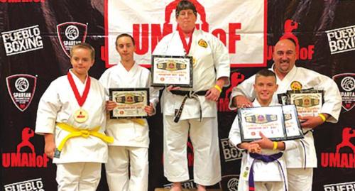 Sensei Angela Sutton, Chad Eckermann, Case Eckermann, Carter Wunderlich and Bailey Wunderlich at their recent competition.