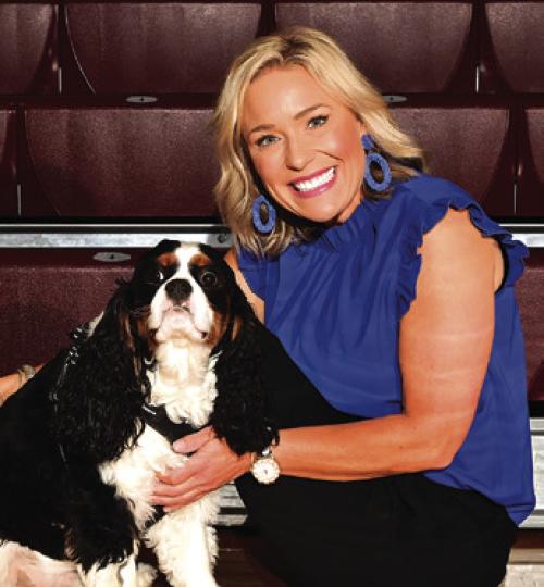 Heather Dornak, right, Flatonia Elementary Counselor, and Winston the dog, are part of a certified therapy team at Flatonia Elementary. They are certified through the Alliance of Therapy Dogs. Winston goes to school with Ms. Dornak everyday.
