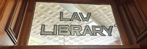 The historic sign over the door to the Law Library at the courthouse.
