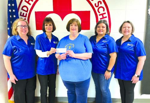 KJZT Family Life Society No. 31 officers presented the KJZT State 50% matching funds check to Sacred Heart Catholic School on May 15. This was from their sponsored plant wheel booth at the schools’ Spring Festival. Pictured from left are President Elizabeth Kallus, Treasurer Barbara Eilert, Principal LaDonna Voelkel, Vice President Nicole Ramirez, and Secretary Marilyn Kothmann.