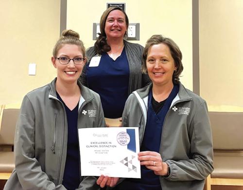 St. Mark’s Advanced Outpatient Wound Center front row, left to right: Jackie Faigle, FNP-C, and Stacie Schramek, RN; back row: Jennifer Scott, RN Program Director.