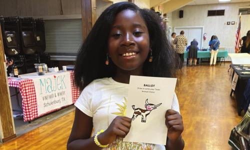 Brieyelle Moore, a soon-to-be fifth-grader at Schulenburg Elementary School, casts her ballot for the longhorn in the League of Women Voters’ Texas animal election.