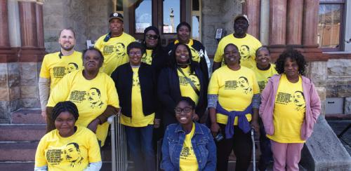 La Grange Juneteenth Committee organizers gather on the steps of the courthouse.