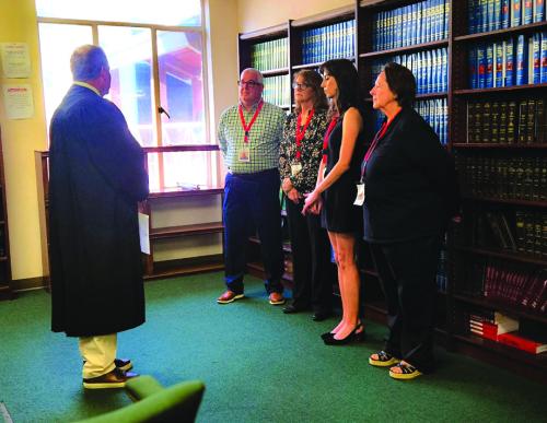 Scott Davis from La Grange, Pamela Quarles from Elgin,, Becky Herrin from Bastrop, and Mary Jo Kilpatrick from Cedar Creek were recently shown in as new CASA Advocates by Judge Eskew.