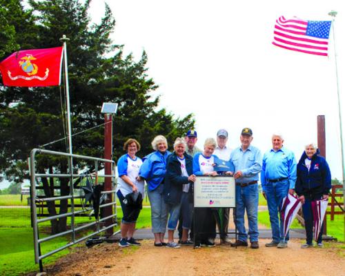 Shown are honoree and organization representatives (from left) Susan Glover, Connie Dittrich, Marti Herring, Vernon Dittrich, Judy and David Zachmeyer, Jim Duffin, Jack and Jennie Muggli.