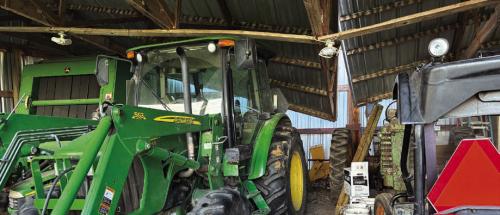 The barn shown here collapsed on some tractors Saturday evening after strong winds from a storm blew through the Daniel Cerny place one mile east of Praha. Cerny said a friend helped get one of the tractors out and prop the barn roof up with a new post. More storms blew through Fayette County Sunday night. Cerny said he’s had plenty of rain, by his count 16-17 inches in the past month in Praha.