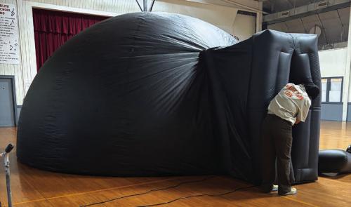 The Houston Museum of Natural Science brought their mobile planetarium for kids to enjoy Wednesday at the Rec. Center in La Grange as part of the Fayette Public Library’s summer reading program events. Photo by Meadow Taylor-Marklin